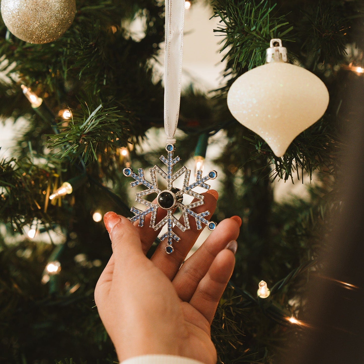 Blauwe sneeuwvlok kerstdecoratie met foto